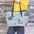 Cute pastel blue bunnies and floral pattern leather tote bag