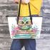 Cute pastel colorful owl sitting on top of books leather tote bag