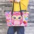 Cute pink owl with a bow on its head surrounded by candy leather tote bag