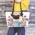 Cute pug dog inside a flower bucket leather tote bag