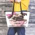 Cute pug puppy with a pink bow on its head leather tote bag