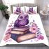 Cute purple owl sitting on top of books surrounded by pink roses bedding set