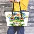 Cute watercolor cartoon frog with glasses and flowers on its head leaather tote bag