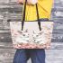 Cute white bunnies with pink flowers leather tote bag