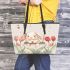 Cute white rabbit sitting on the swing leather tote bag