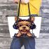 Cute yorkshire terrier dog wearing headphones leather tote bag