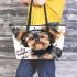 Cute yorkshire terrier dog wearing headphones leather tote bag