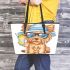 Cute yorkshire terrier in a summer hat and sunglasses holding leather tote bag