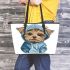 Cute yorkshire terrier in hoodie leather tote bag