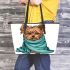 Cute yorkshire terrier wrapped in teal blanket leather tote bag