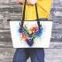 Deer head with colorful watercolor splash behind leather totee bag