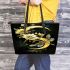 Dragonflies and three flowers on the moon leather tote bag