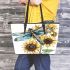 Dragonfly with blue wings and black eyes leather tote bag