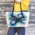 Dragonfly with swirling lines and swirls leather tote bag