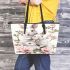 Family of three white rabbits with pink flowers leather tote bag