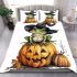 Frog wearing a black witch's hat sitting on top of a halloween pumpkin bedding set