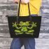 Green frog sitting on the ground doing yoga leaather tote bag