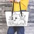 Happy corgi with a butterfly on its nose in a garden leather tote bag