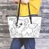 Happy corgi with a butterfly on its nose in a garden leather tote bag