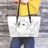 Happy corgi with a butterfly on its nose in a garden leather tote bag