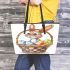 Happy easter bunny with colorful eggs in a basket isolated leather tote bag