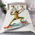 Happy frog wearing sunglasses surfing on a surfboard while holding bedding set