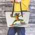 Happy frog wearing sunglasses surfing on a surfboard while holding leaather tote bag