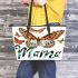 Mnteal orange and brown butterflies mama Leather Tote Bag