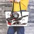 Monkey wearing hat and skiing with electric guitar leather tote bag