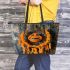 Orange grinchy smile and dream catcher leather tote bag