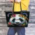 Panda with black and white fur and colorful floral leather tote bag