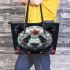 Panda with black and white fur and colorful floral leather tote bag