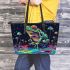 Psychedelic frog sitting on the edge of an alien pond leaather tote bag