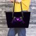 Purple frog with bright green eyes and on a solid leaather tote bag