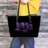 Purple frog with bright green eyes and on a solid leaather tote bag