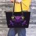 Purple frog with bright green eyes and on a solid leaather tote bag