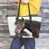 Realistic colored pencil drawing of an elegant brown horse leather tote bag