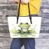 Smiling frog sitting on a pond leaather tote bag