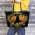 Two colorful owls with yellow feathers leather tote bag