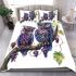Two cute purple and blue owls sitting on the branch bedding set