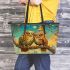 Two owls in love looking at each other with an owl family leather tote bag