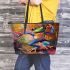 Vibrant painting of an happy dancing frog leaather tote bag