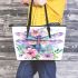 Watercolor dragonfly surrounded leather tote bag