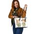 Adorable two bunnies holding hands dressed in green leather tote bag