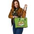 An adorable green frog eating ramen noodles leaather tote bag