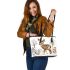 Baby deer in the snow leather totee bag