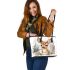 Baby deer in the snow leather totee bag