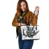 Black and white owl with bright teal eyes leather tote bag