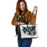 Black and white owl with turquoise highlights leather tote bag