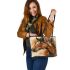 Brown horse with an indian feather headdress leather tote bag